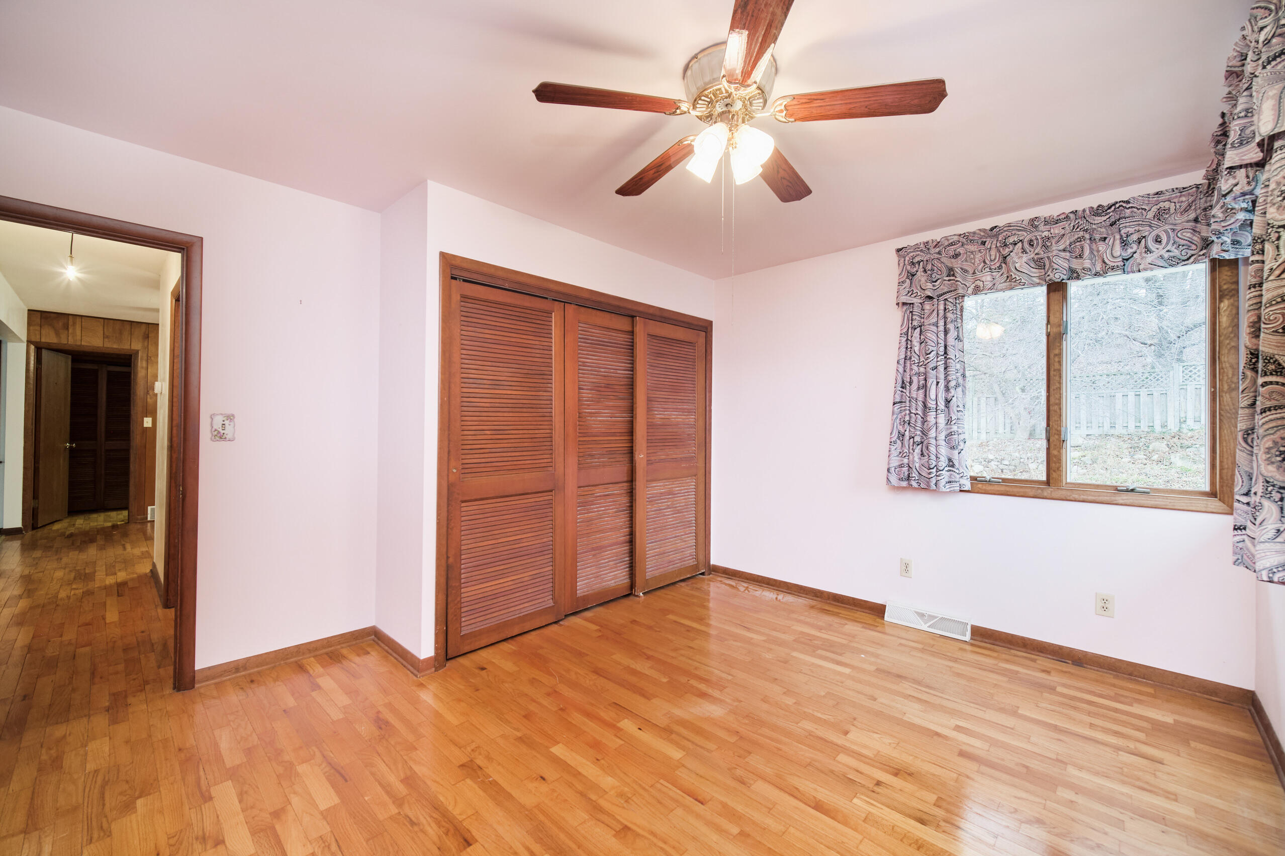 302 Condon Road Manistee, MI 49660 - Photo 14 of 56 Bedroom #1 has hardwood floors
