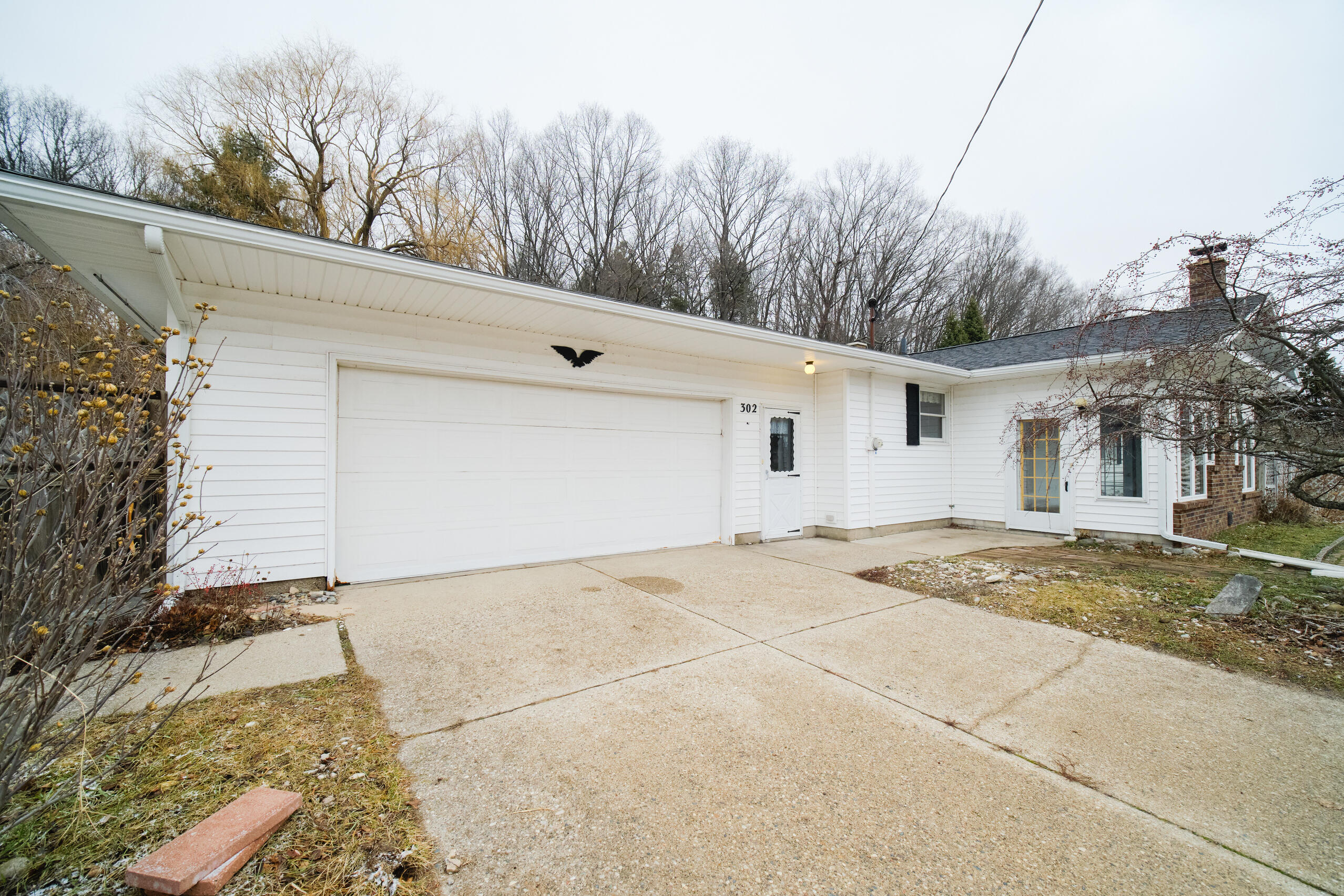 302 Condon Road Manistee, MI 49660 - Photo 2 of 56 Attached 2 car garage