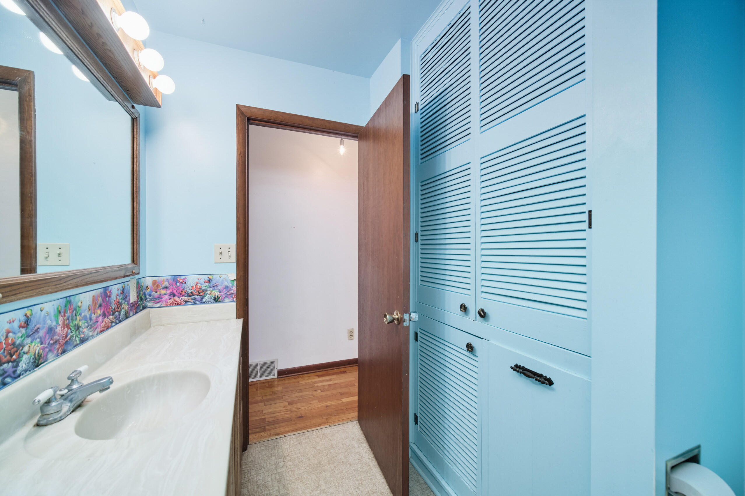 302 Condon Road Manistee, MI 49660 - Photo 24 of 56 Storage closet in full bath