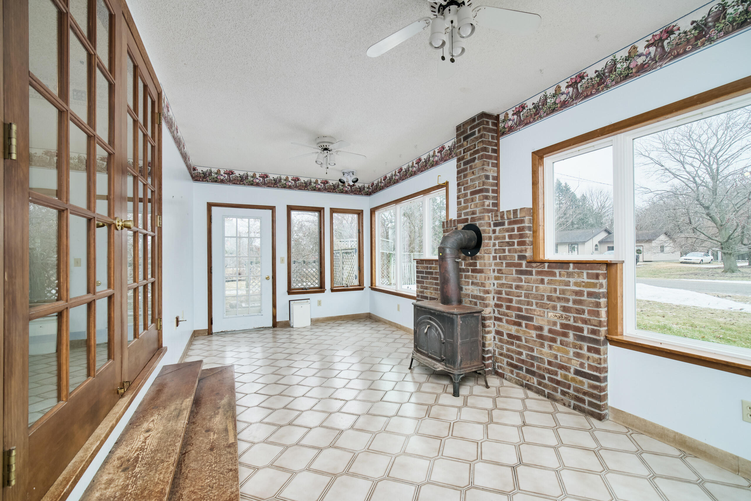 302 Condon Road Manistee, MI 49660 - Photo 28 of 56 Southern exposure w/3 walls of windows
