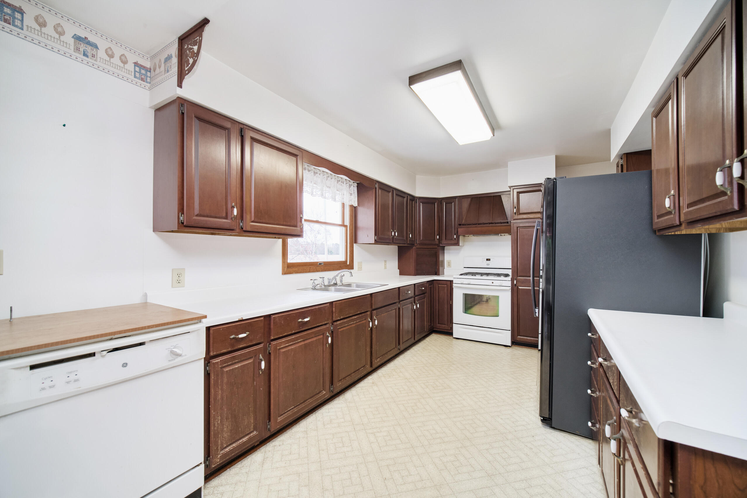 302 Condon Road Manistee, MI 49660 - Photo 3 of 56 Expansive cabinet and counter space