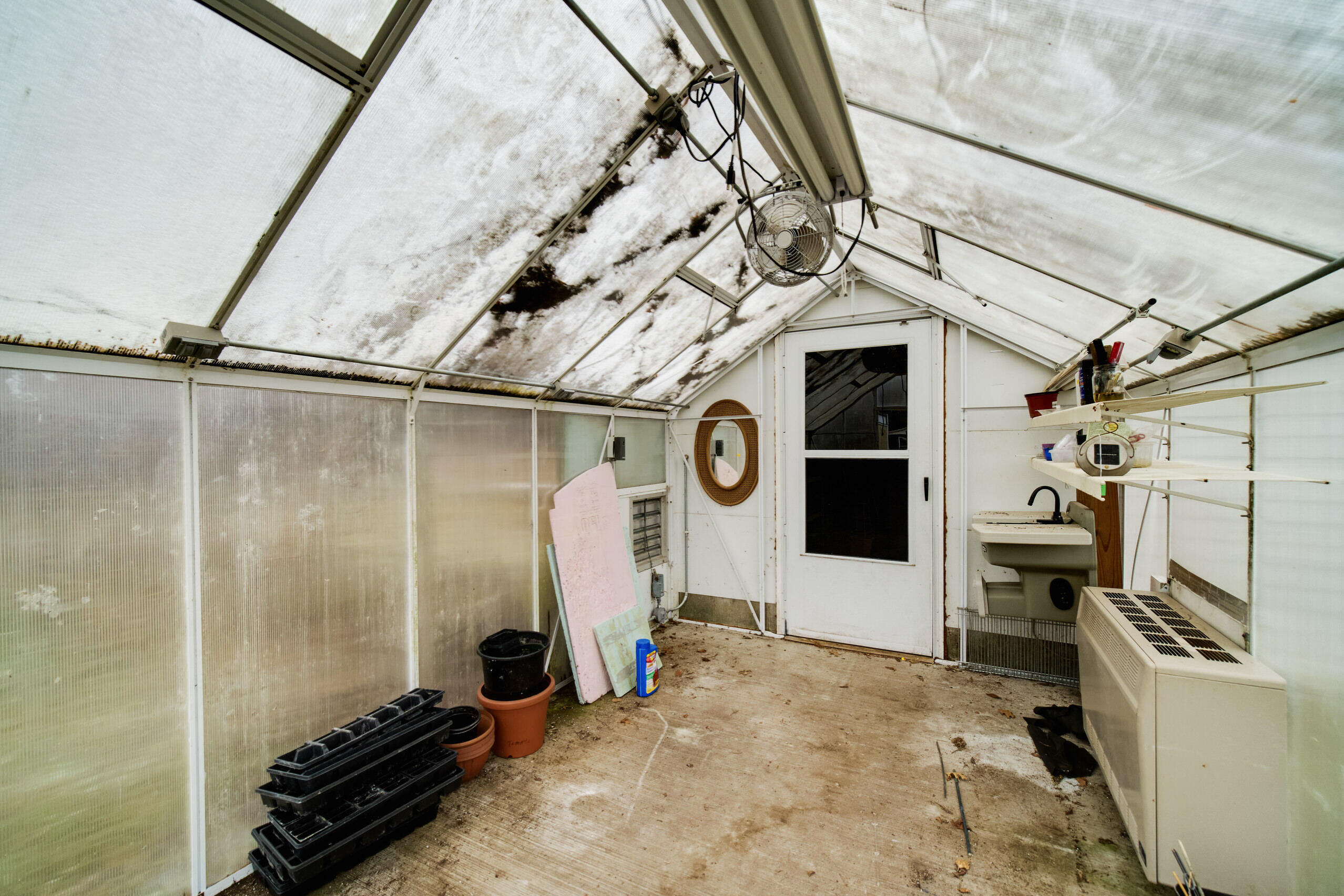 302 Condon Road Manistee, MI 49660 - Photo 42 of 56 Inside the greenhouse