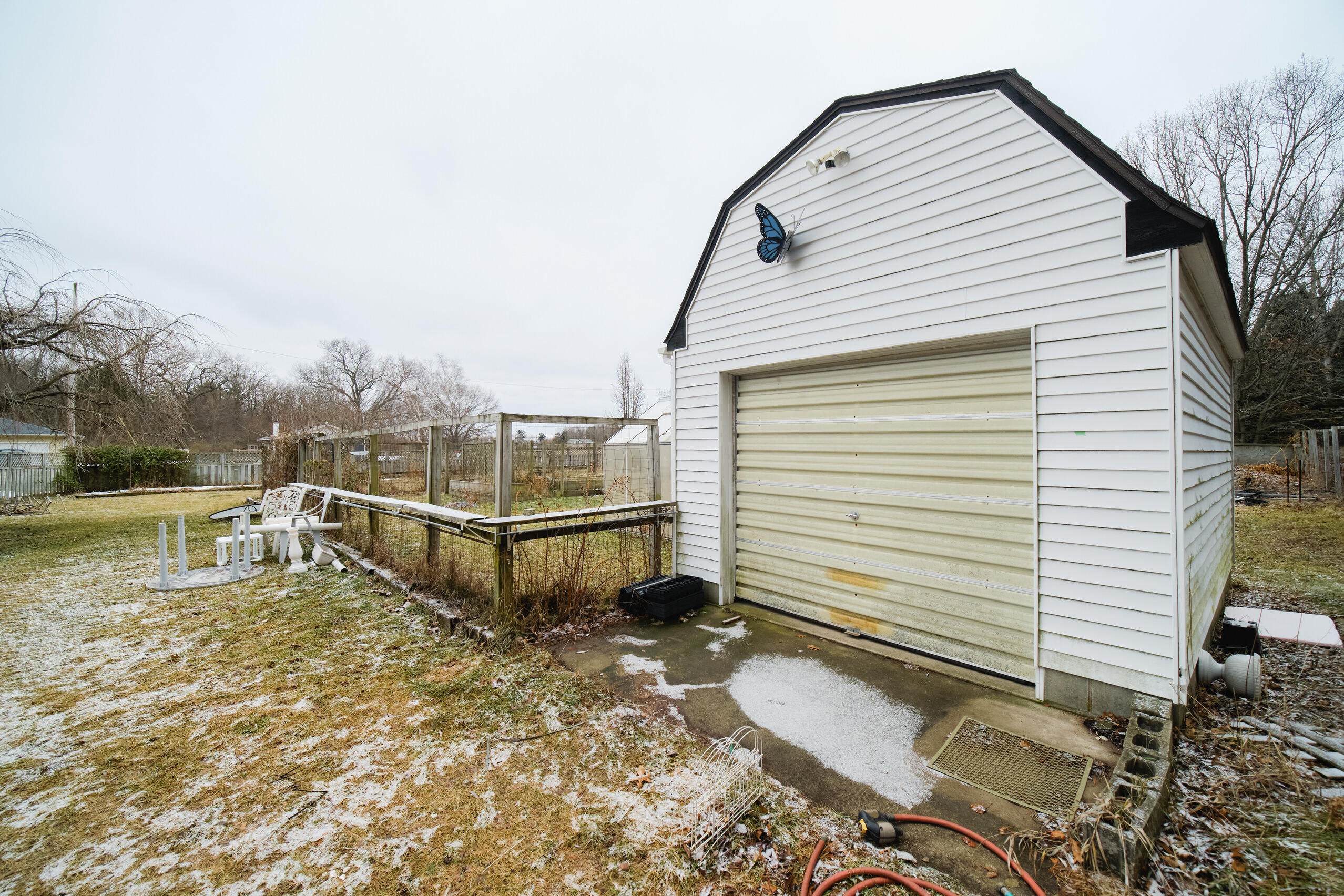 302 Condon Road Manistee, MI 49660 - Photo 44 of 56 Wood storage bldg with door for mower