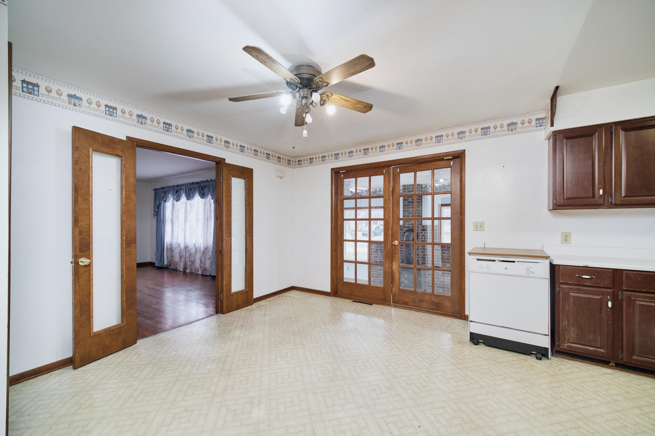 302 Condon Road Manistee, MI 49660 - Photo 7 of 56 Dining with doors to flexible room