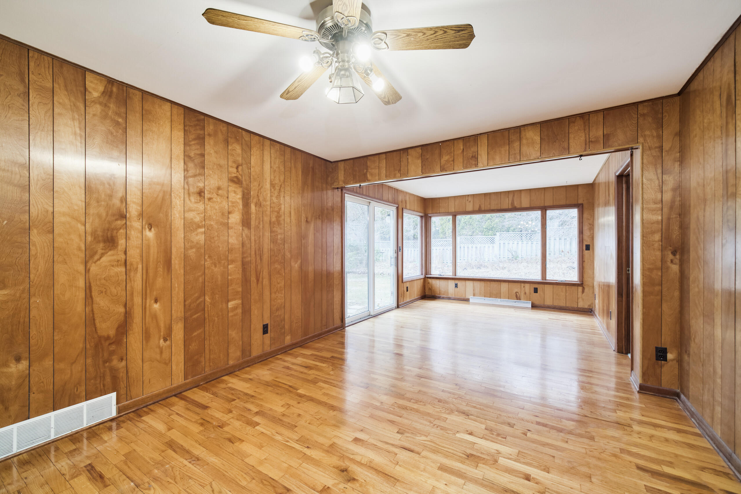 302 Condon Road Manistee, MI 49660 - Photo 9 of 56 Living room back window overlooks yard