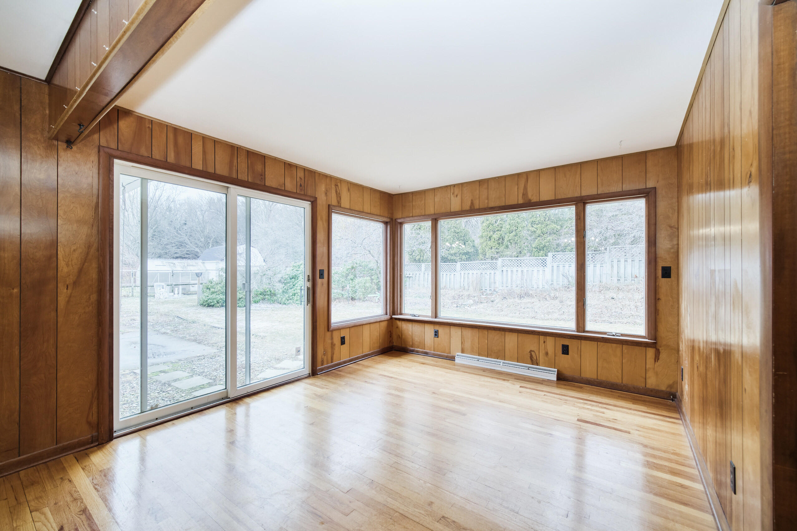 302 Condon Road Manistee, MI 49660 - Photo 10 of 56 Sliding doors from living room to patio
