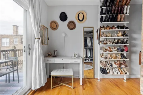 a view of table chair and window