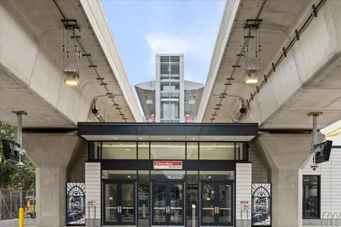a view of a car parked front of a house