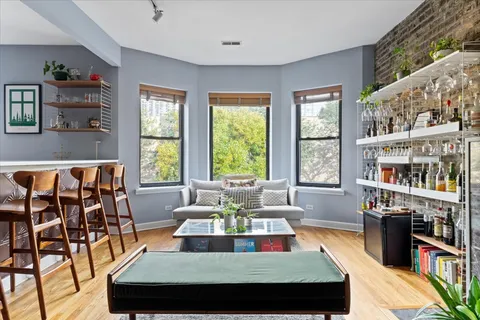a view of a living room and dining room