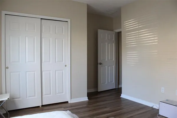 a view of a livingroom with wooden floor