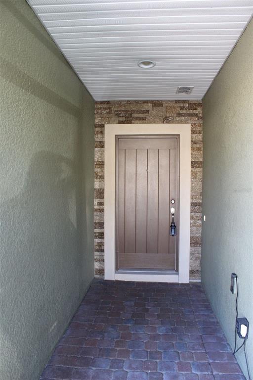 1408 Lanier Point Place Kissimmee, FL 34746 - Photo 24 of 31 a view of entryway