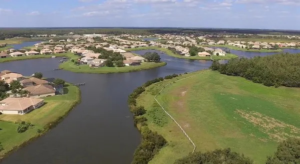 a view of a lake with an outdoor space
