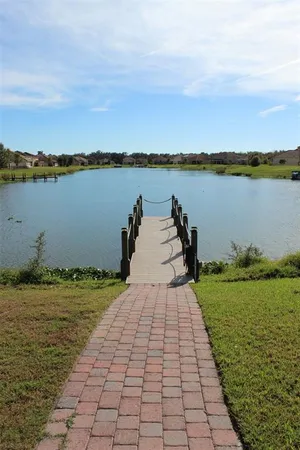 a view of a lake with a big yard