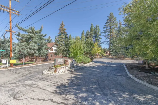 a view of a balcony with wooden floor