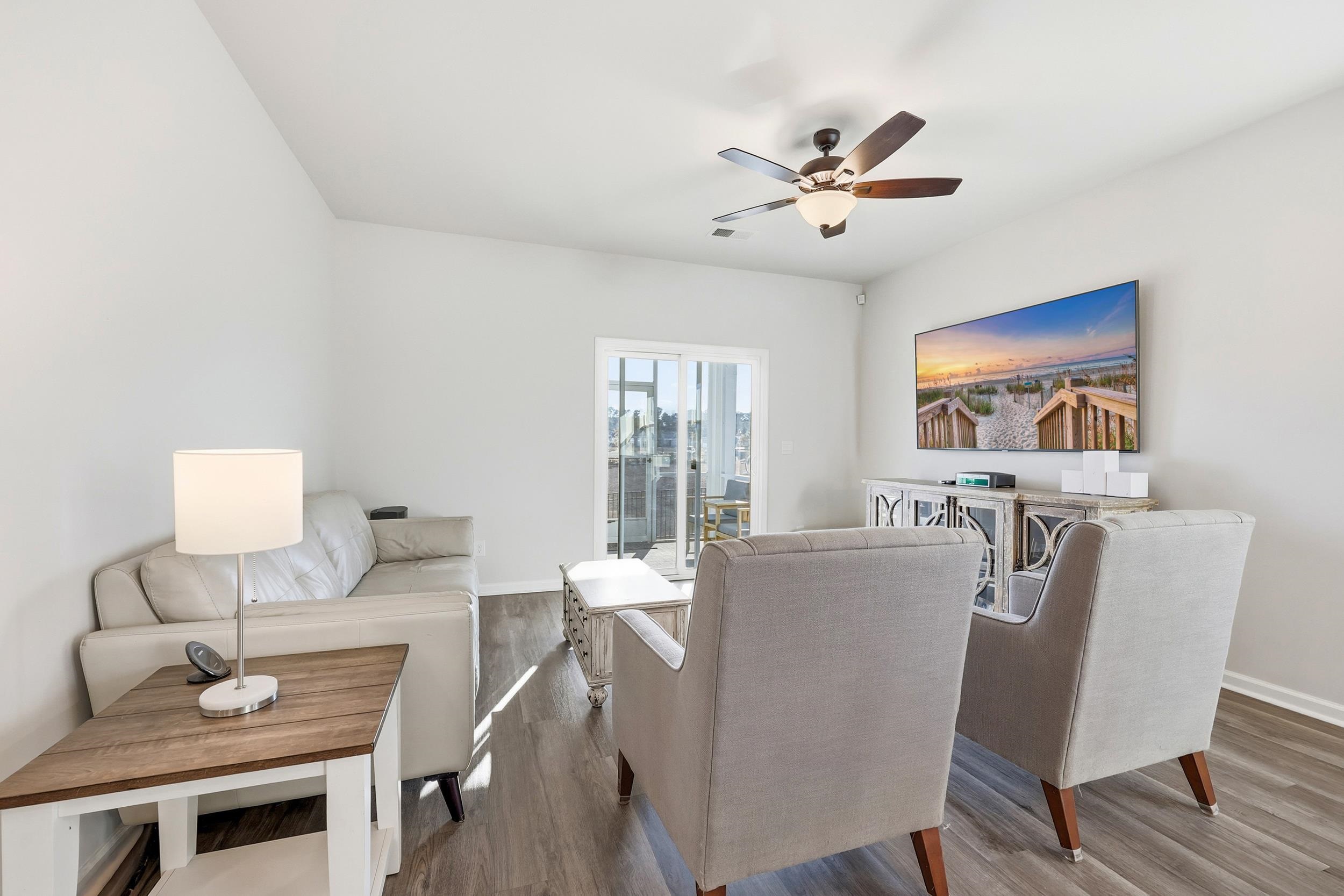 308 Picnic Basket Place Longs, SC 29568 - Photo 13 of 40 Living area featuring wood finished floors and ceiling fan