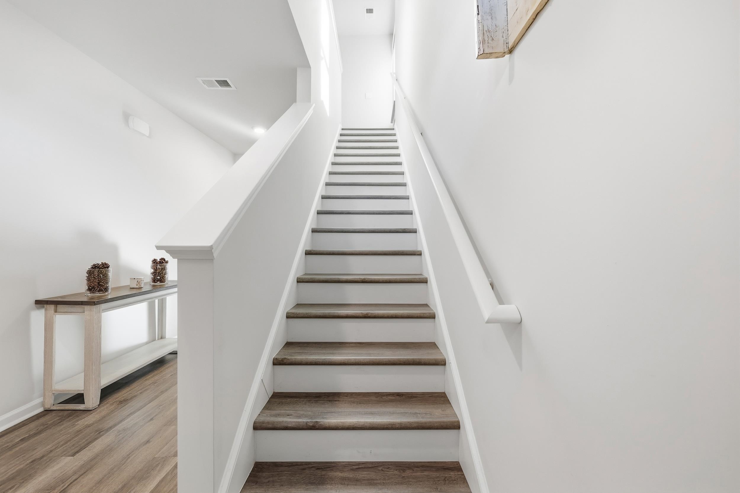 308 Picnic Basket Place Longs, SC 29568 - Photo 18 of 40 Staircase featuring wood finished floors