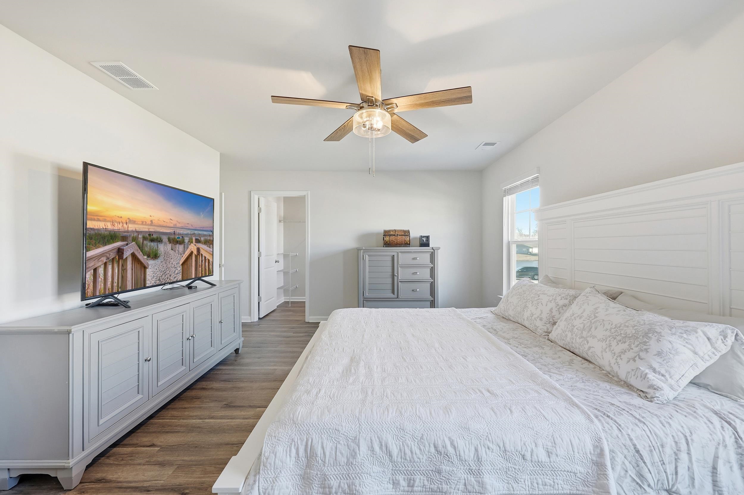 308 Picnic Basket Place Longs, SC 29568 - Photo 21 of 40 Bedroom with wood finished floors and ceiling fan