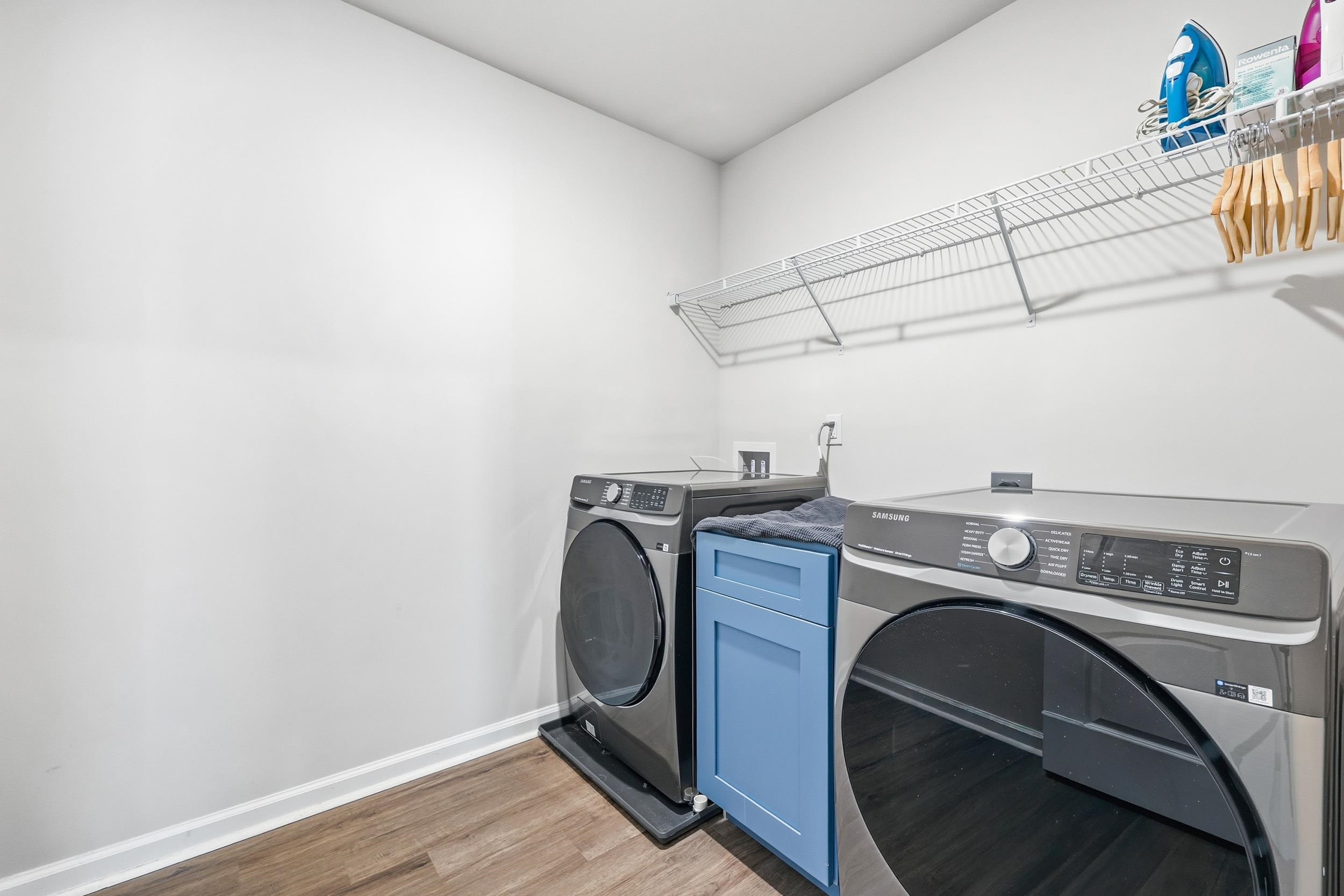 308 Picnic Basket Place Longs, SC 29568 - Photo 26 of 40 Laundry room featuring light wood-style flooring and separate washer and dryer