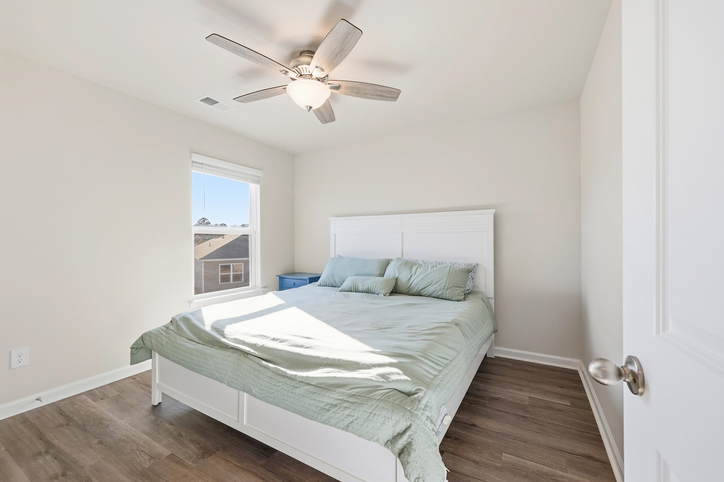 308 Picnic Basket Place Longs, SC 29568 - Photo 29 of 40 Bedroom featuring a ceiling fan and dark wood-type flooring