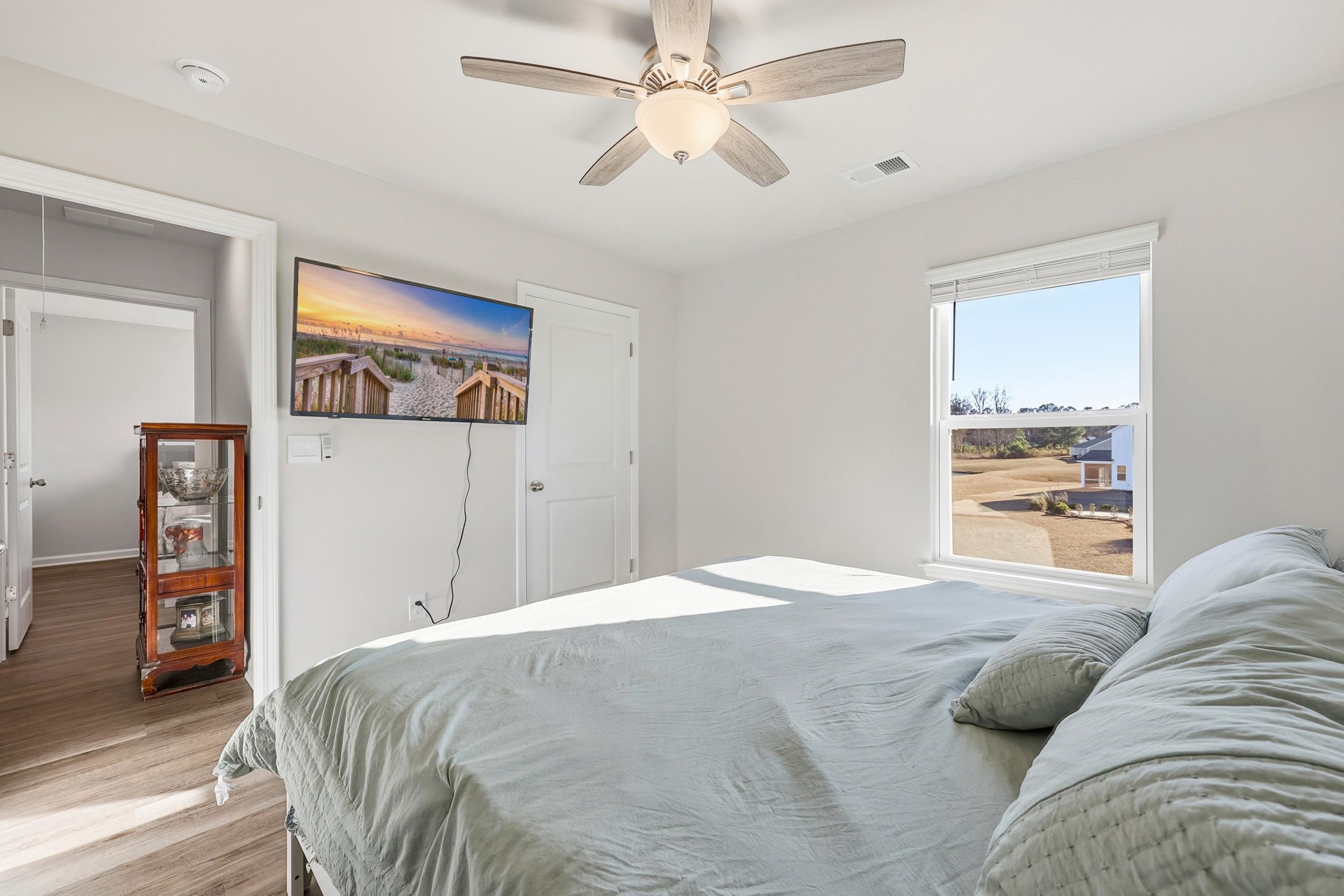 308 Picnic Basket Place Longs, SC 29568 - Photo 30 of 40 Bedroom with ceiling fan and light wood finished floors