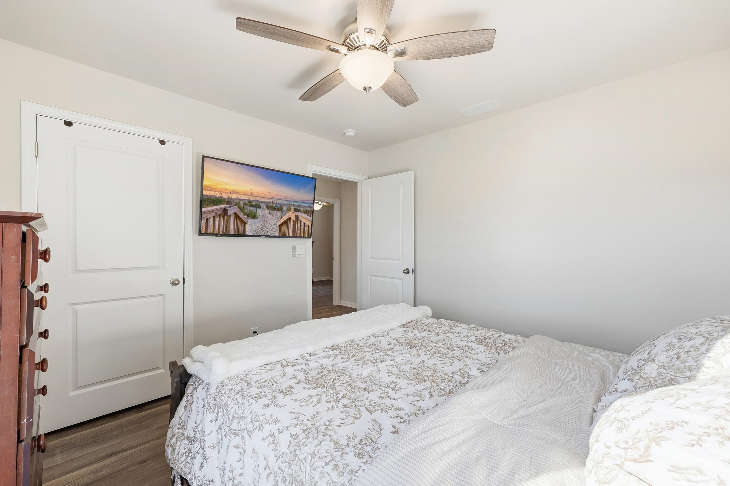 308 Picnic Basket Place Longs, SC 29568 - Photo 33 of 40 Bedroom featuring dark wood-style flooring and a ceiling fan