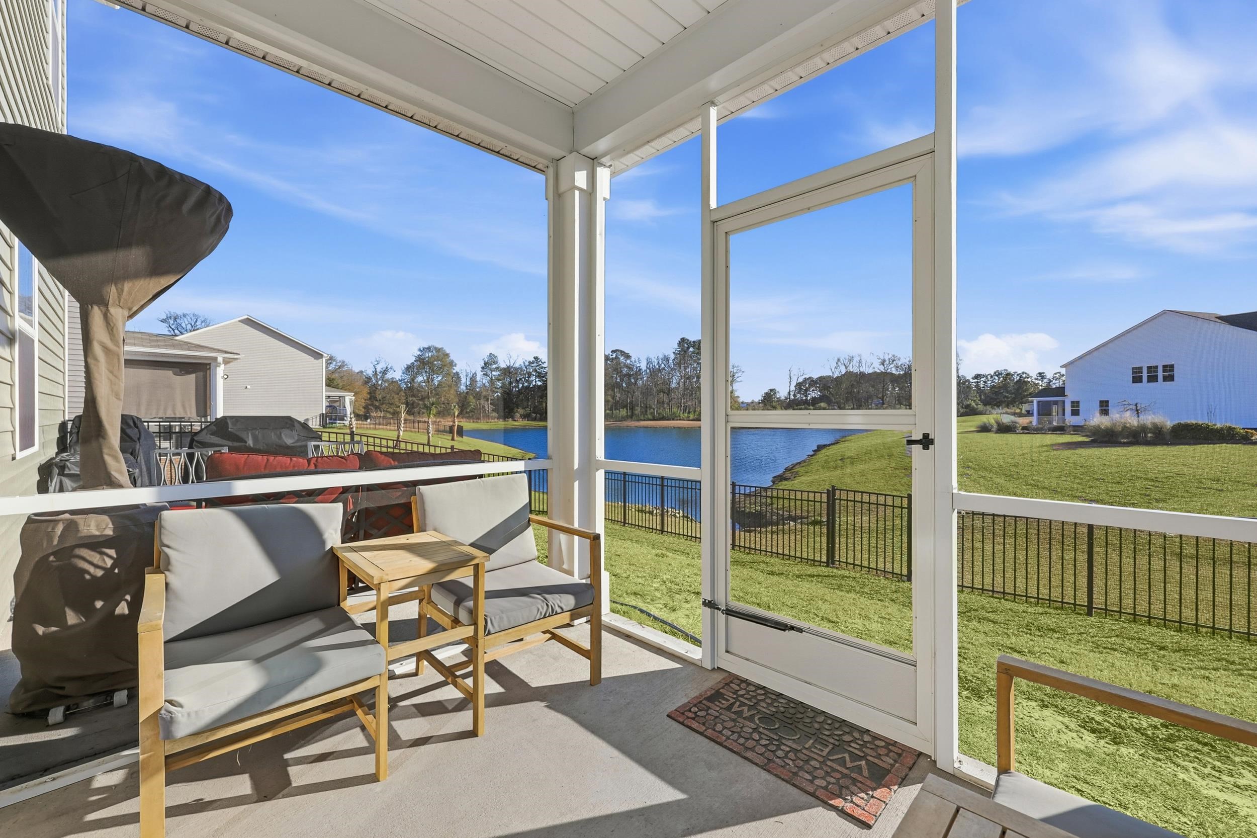 308 Picnic Basket Place Longs, SC 29568 - Photo 34 of 40 Sunroom / solarium with a water view