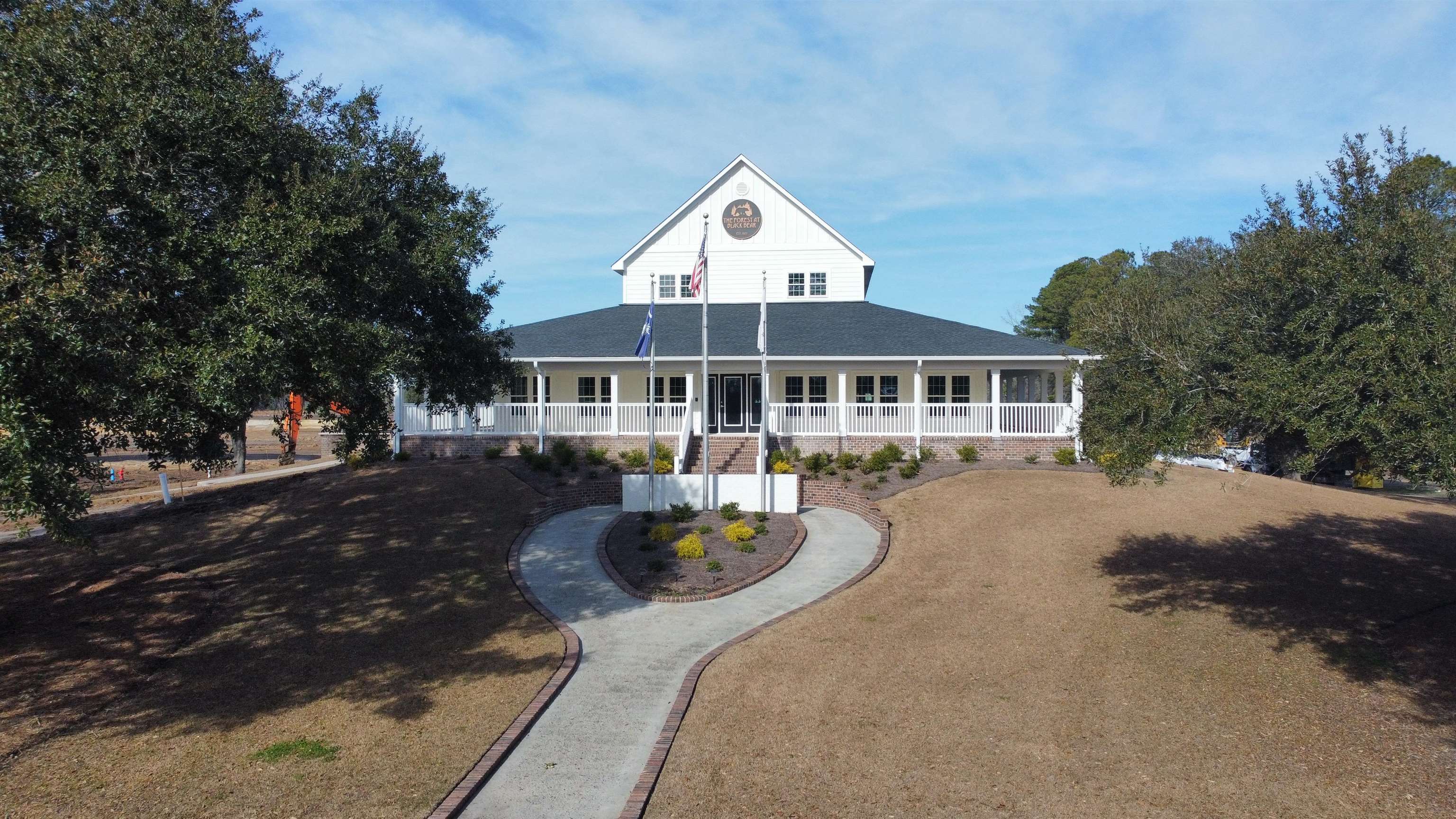 308 Picnic Basket Place Longs, SC 29568 - Photo 39 of 40 Country-style home with a porch, stairs, a front yard, and a shingled roof