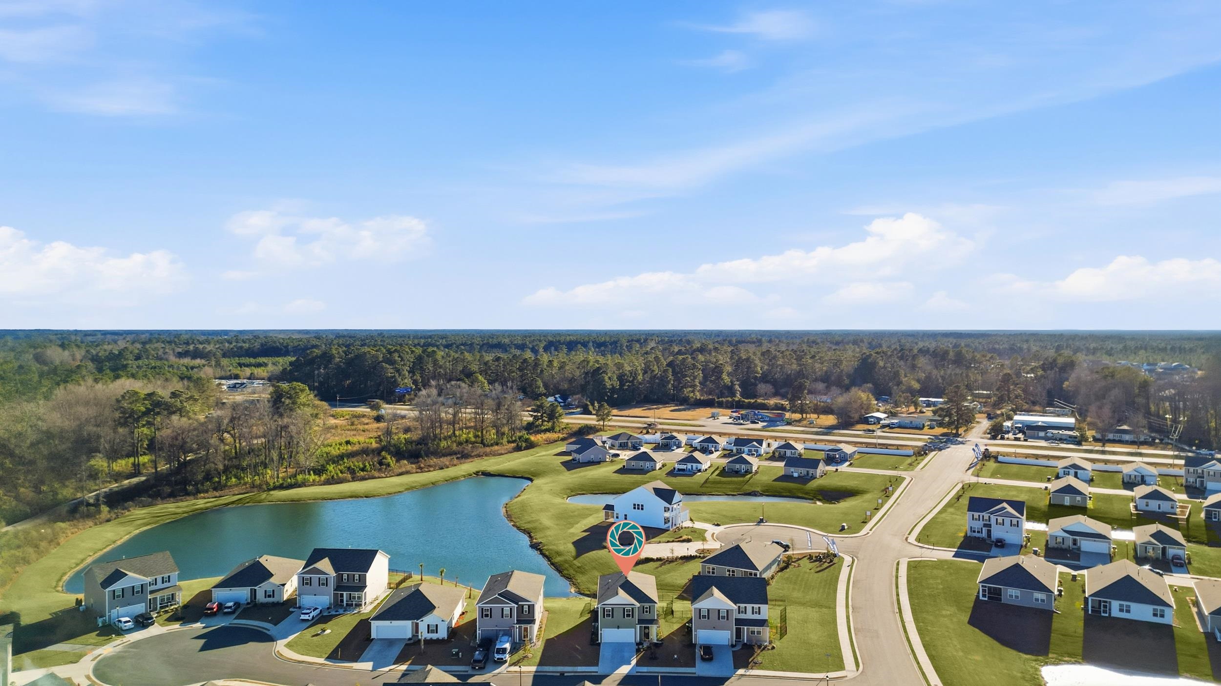308 Picnic Basket Place Longs, SC 29568 - Photo 5 of 40 Aerial perspective of suburban area featuring a large body of water