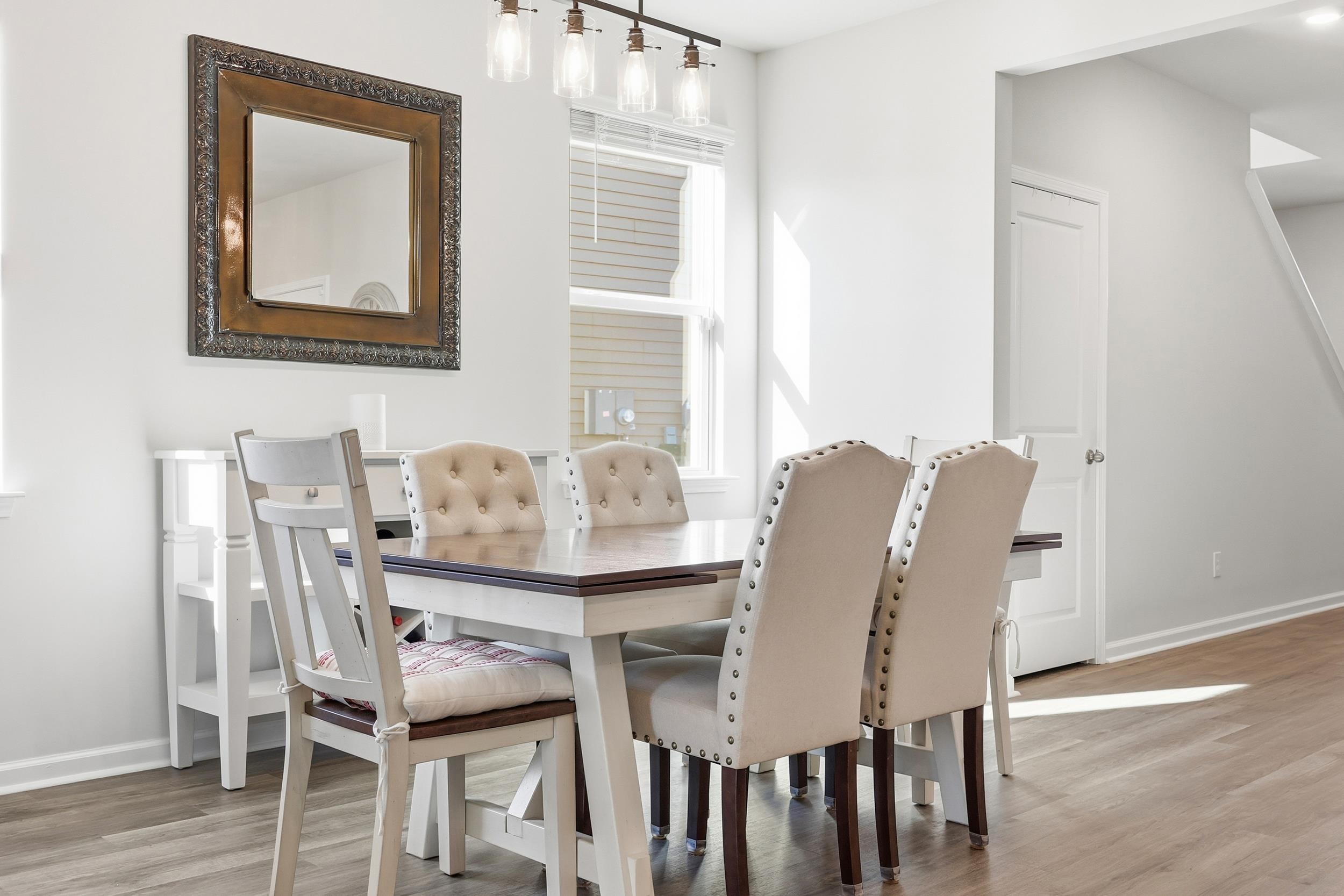 308 Picnic Basket Place Longs, SC 29568 - Photo 9 of 40 Dining area with baseboards and light wood-type flooring