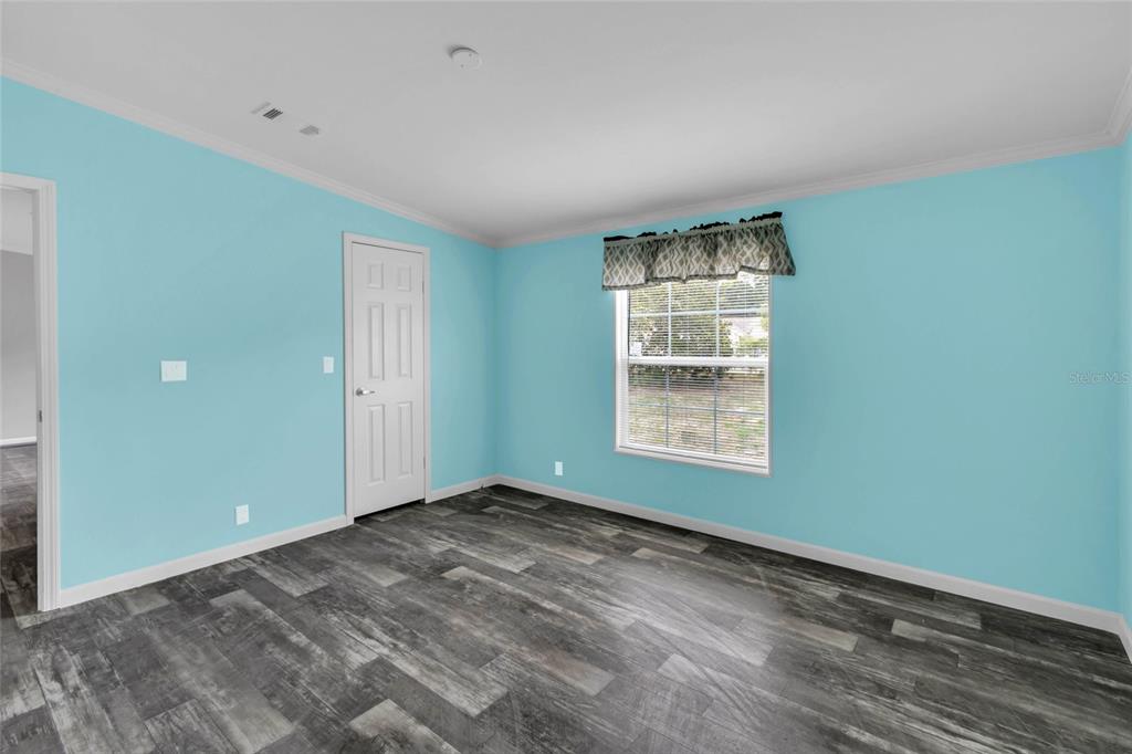 3264 Stephens Boulevard Spring Hill, FL 34606 - Photo 15 of 35 a view of an empty room with a window
