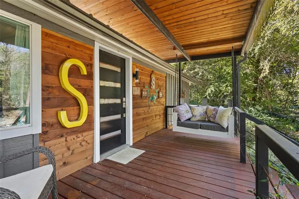 a view of a chairs in the balcony