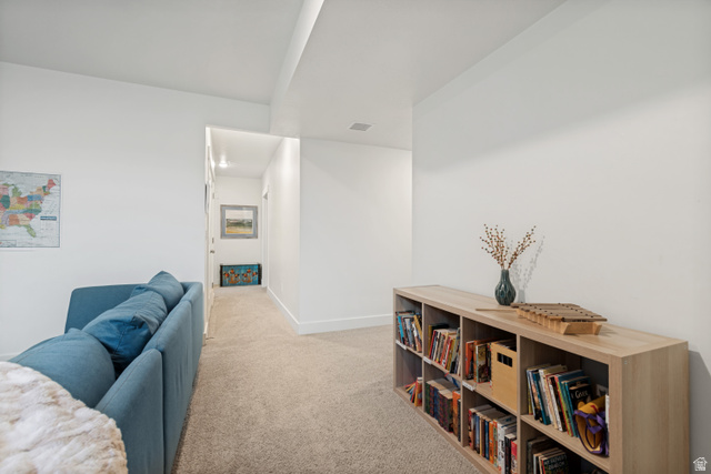 683 Kings Landing Tooele, UT 84074 - Photo 25 of 39 Carpeted interior space featuring white walls and baseboards