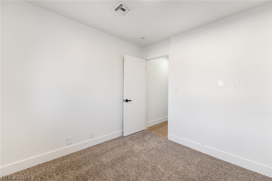 429 Crestway Road Henderson, NV 89015 - Photo 31 of 56 A spacious, neutral room offers a clean canvas for your personal style and comfort.