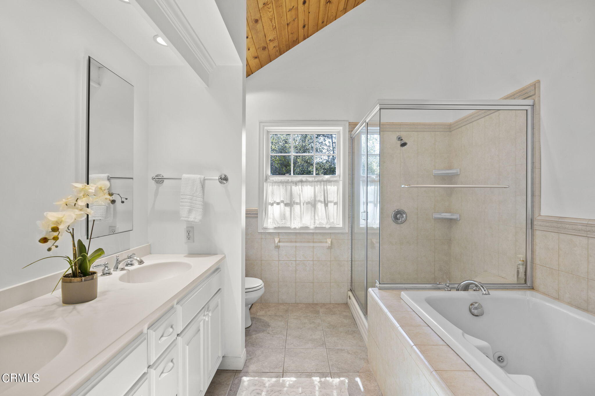 601 Foothill Road Ojai, CA 93023 - Photo 20 of 47 a bathroom with a tub sink and mirror