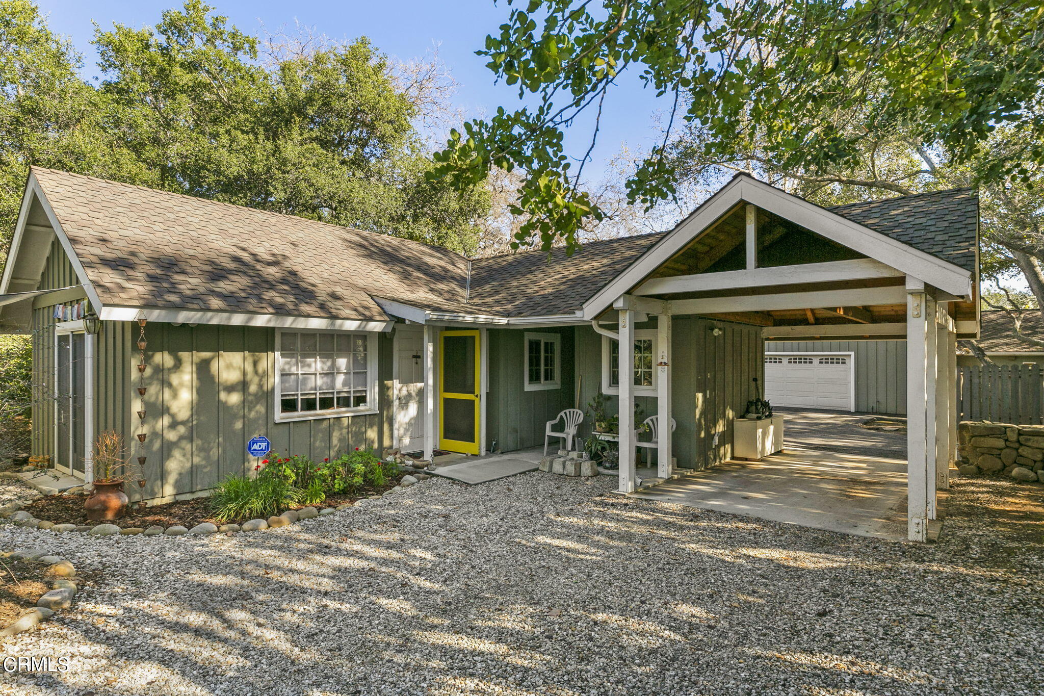 601 Foothill Road Ojai, CA 93023 - Photo 2 of 47 a front view of a house with garden