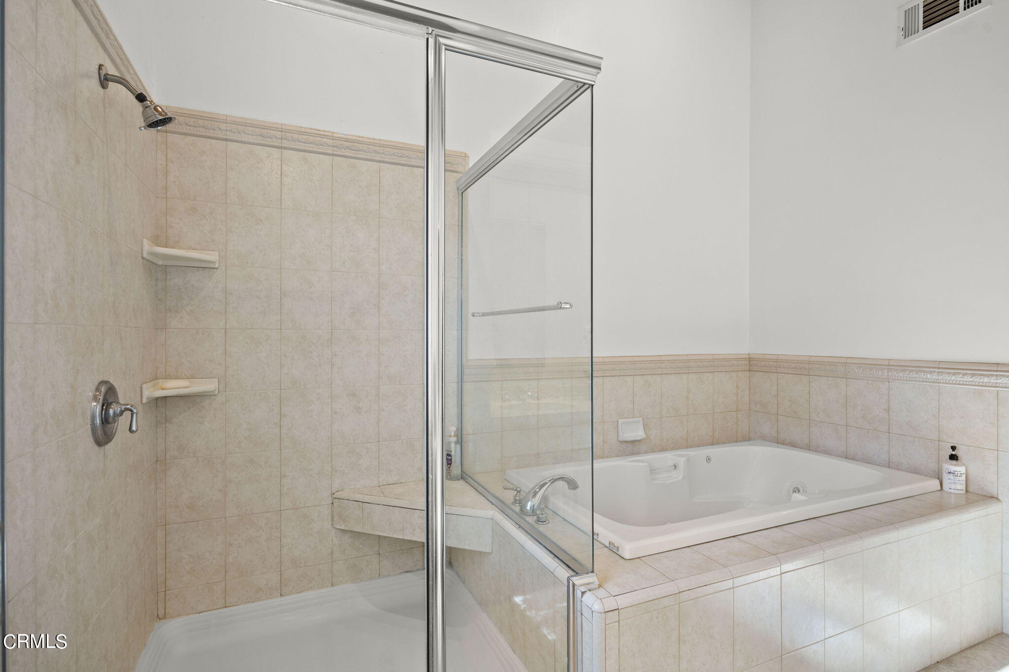 601 Foothill Road Ojai, CA 93023 - Photo 22 of 47 a bathroom with a bathtub and a shower