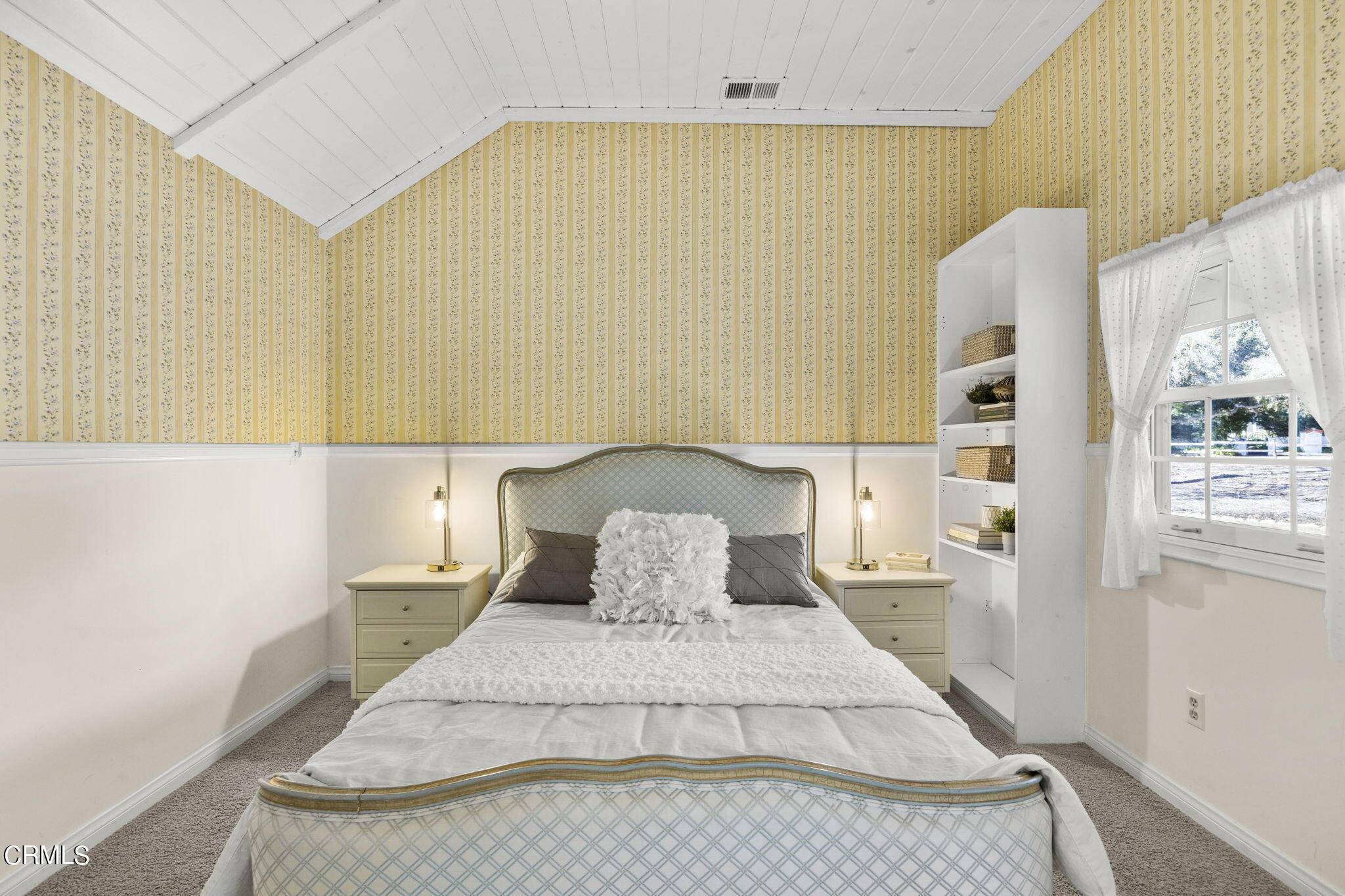 601 Foothill Road Ojai, CA 93023 - Photo 24 of 47 a bedroom with a bed and next to a window