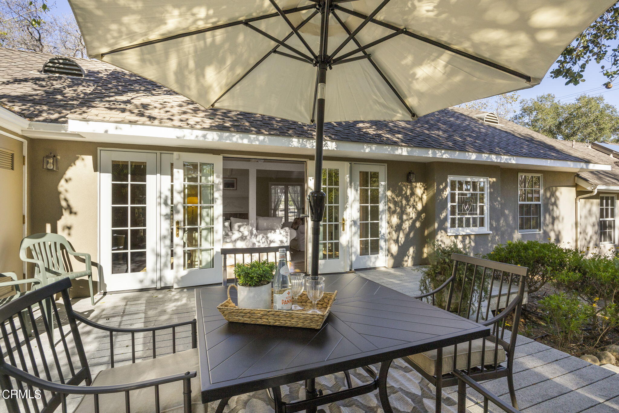 601 Foothill Road Ojai, CA 93023 - Photo 31 of 47 a view of a patio with a table and chairs