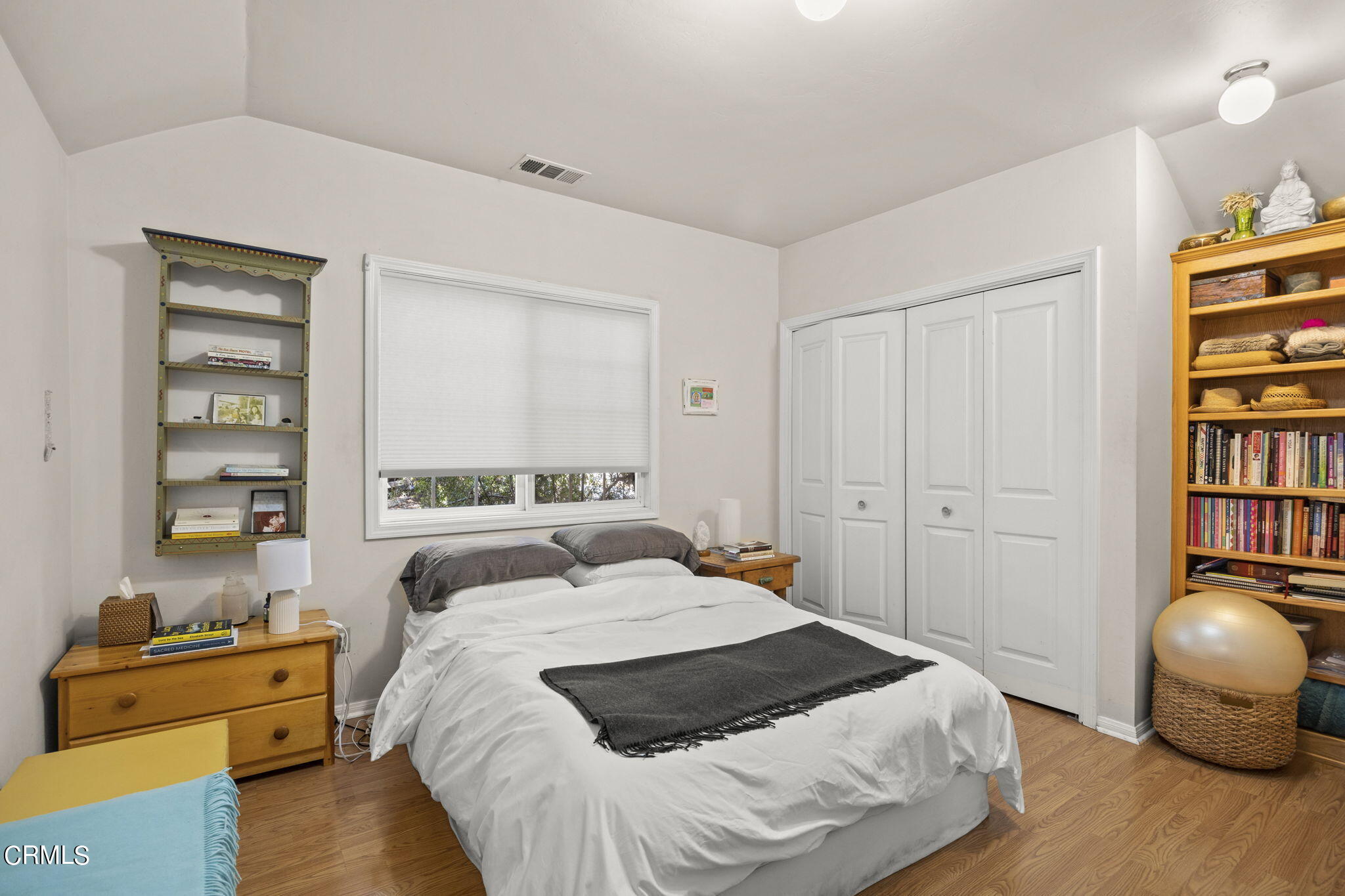 601 Foothill Road Ojai, CA 93023 - Photo 40 of 47 a bedroom with a bed and a chair