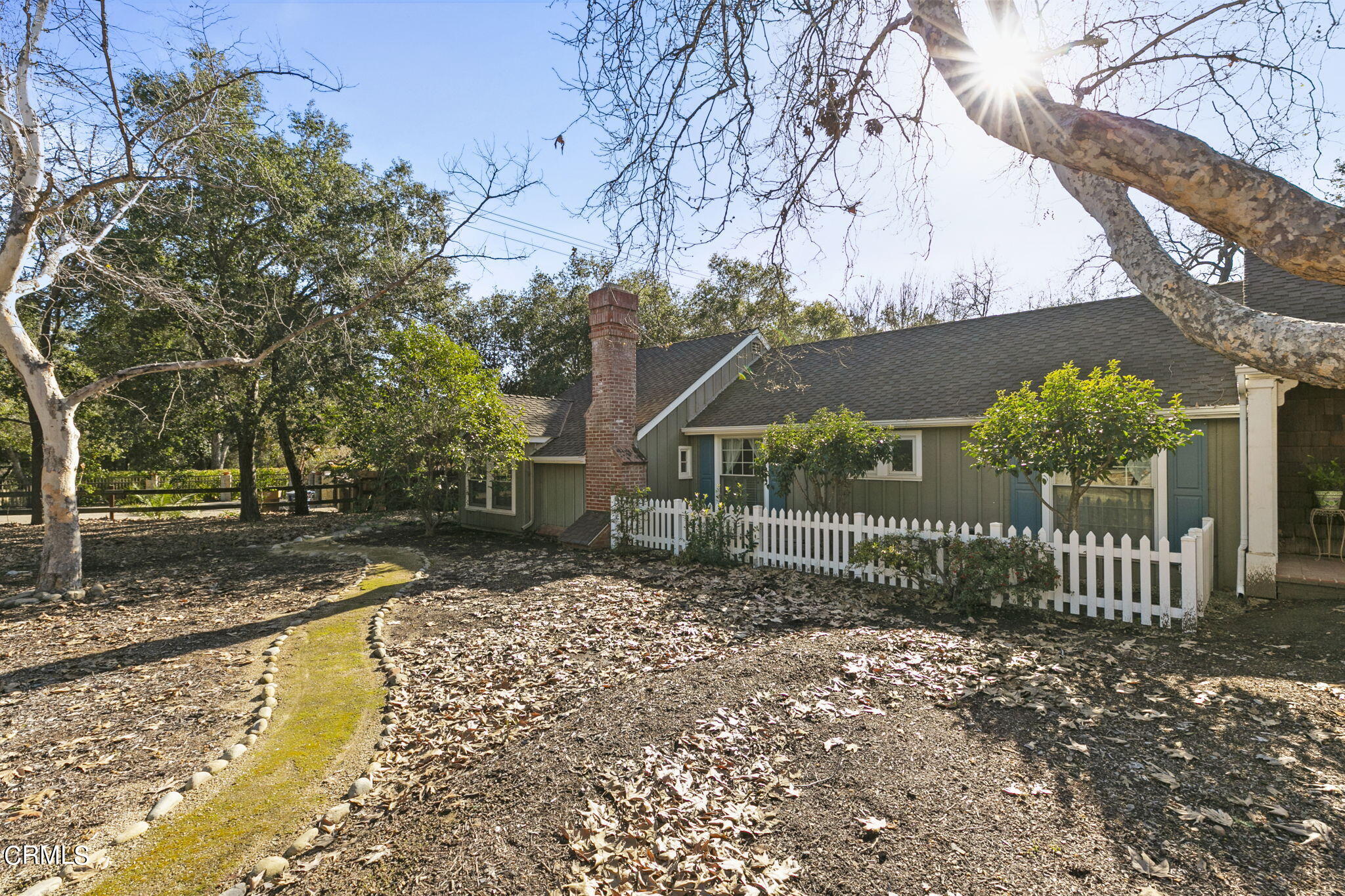 601 Foothill Road Ojai, CA 93023 - Photo 45 of 47 a view of a garden with wooden fence