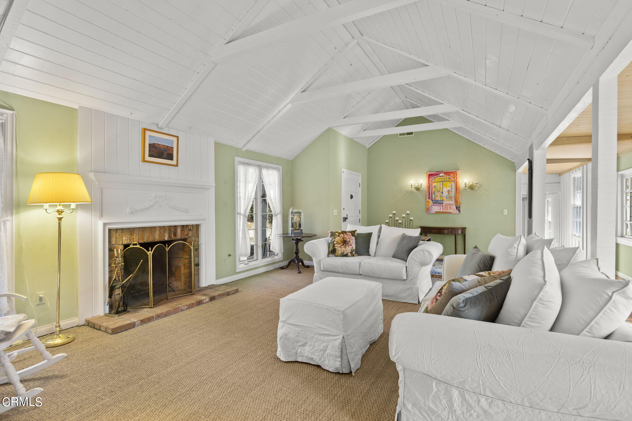 601 Foothill Road Ojai, CA 93023 - Photo 6 of 47 a living room with furniture and a fireplace