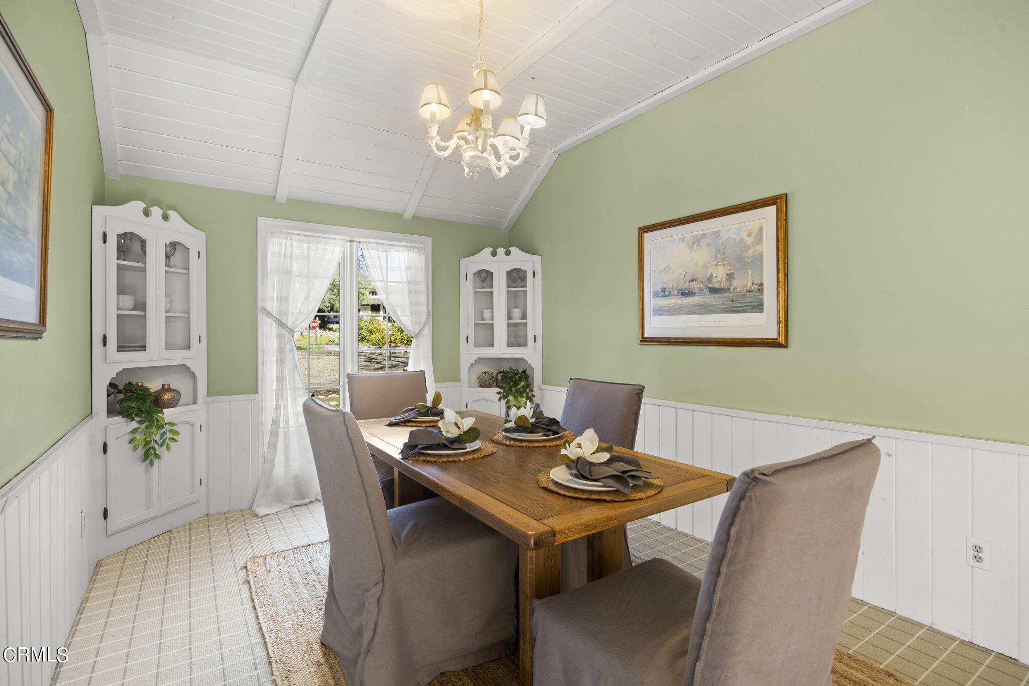 601 Foothill Road Ojai, CA 93023 - Photo 7 of 47 a view of a dining room with furniture and chandelier