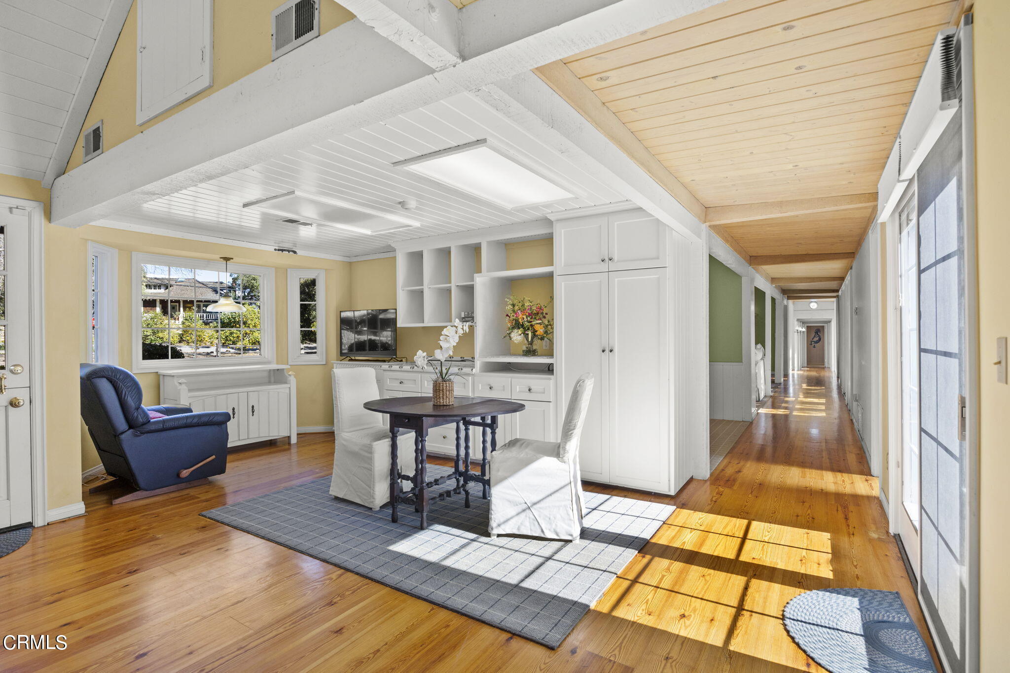 601 Foothill Road Ojai, CA 93023 - Photo 8 of 47 a living room with furniture a dining table and large windows