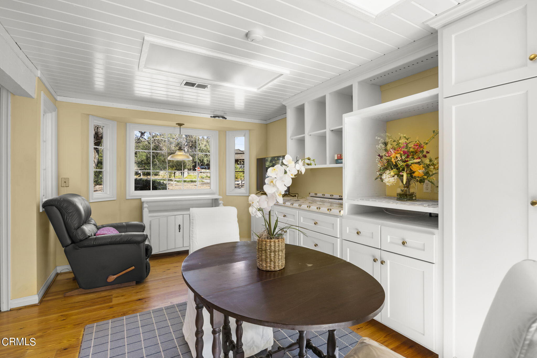 601 Foothill Road Ojai, CA 93023 - Photo 9 of 47 a kitchen with a table chairs stove and refrigerator