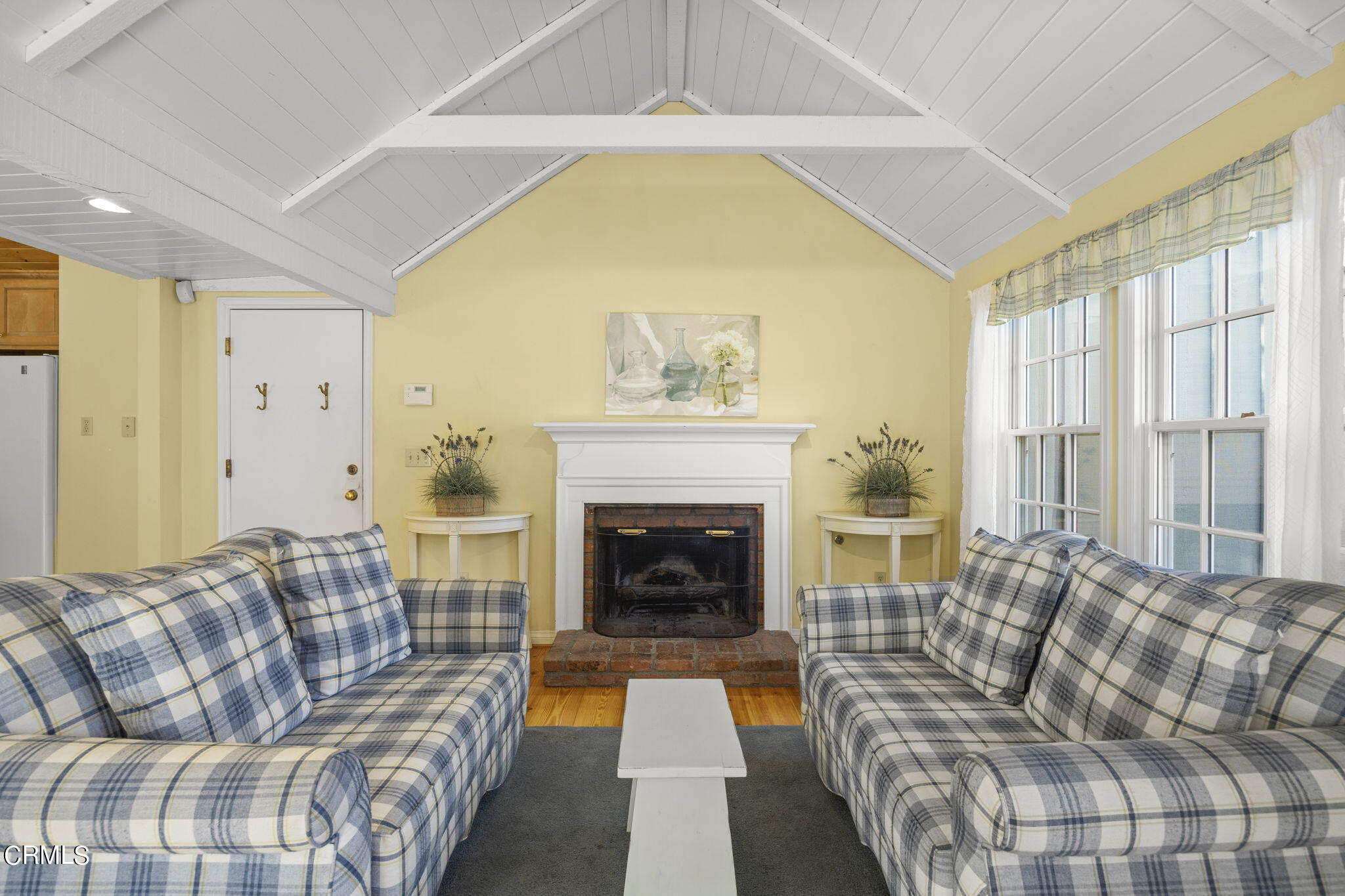 601 Foothill Road Ojai, CA 93023 - Photo 10 of 47 a living room with furniture and a fireplace
