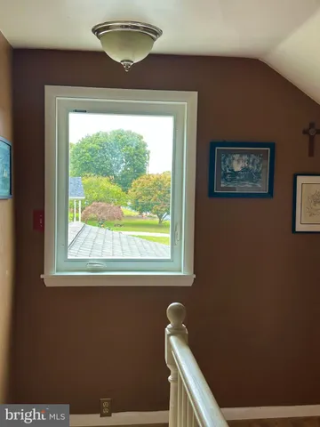 a view of a hallway to a house