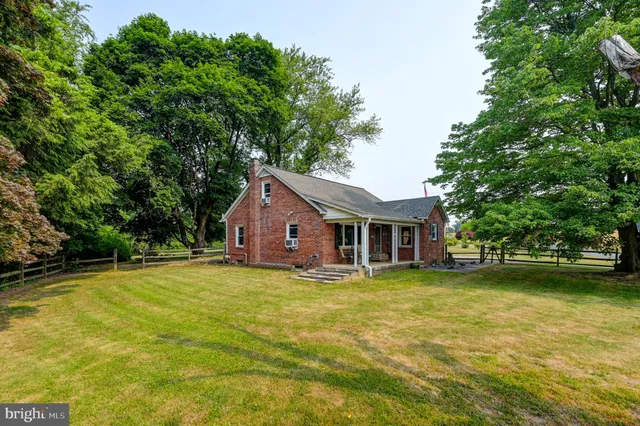 front view of a house with a big yard