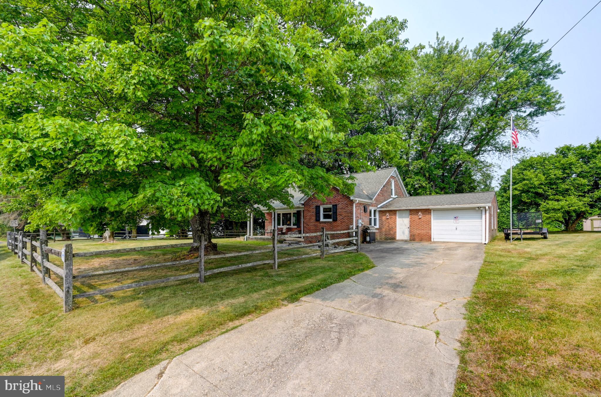 5371 Long Corner Road White Hall, MD 21161 - Photo 28 of 30 front view of a house with a big yard