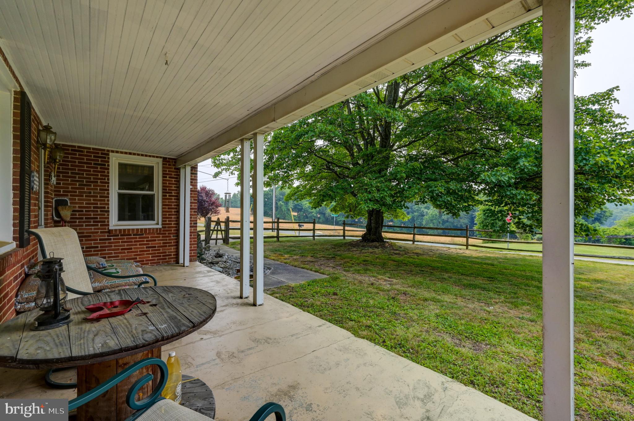 5371 Long Corner Road White Hall, MD 21161 - Photo 5 of 30 a backyard of a house with seating space