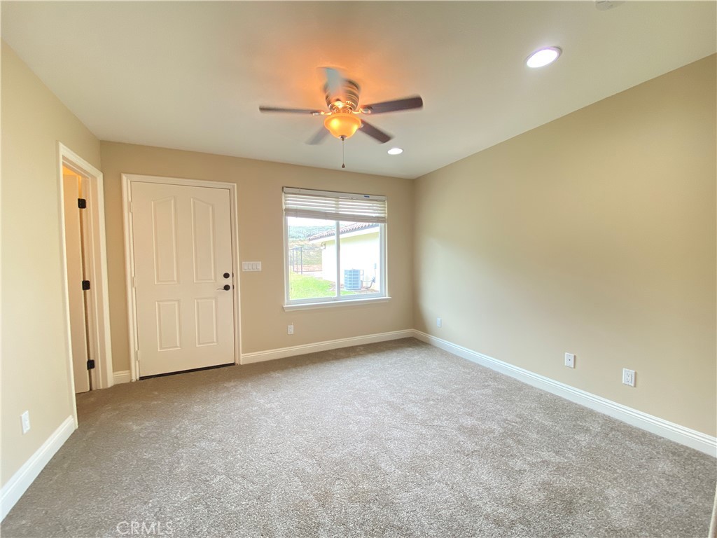 14670 Gilman Springs Road Moreno Valley, CA 92555 - Photo 36 of 50 a view of an empty room with a window